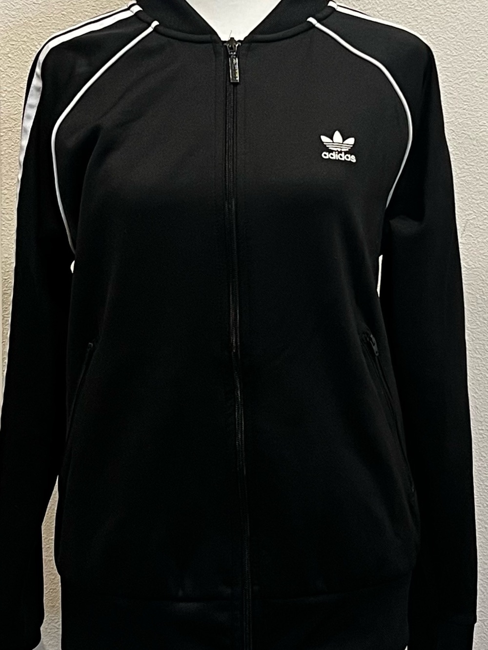 adidas Black zippered athletic Jacket with White stripes women’s medium